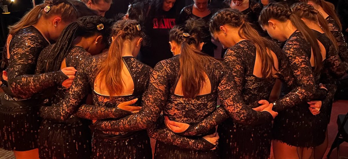 Team huddle backstage